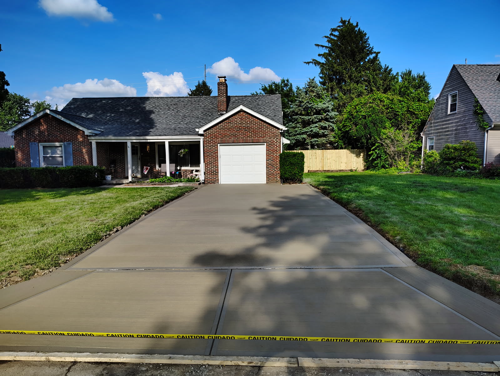 Driveway with brick house